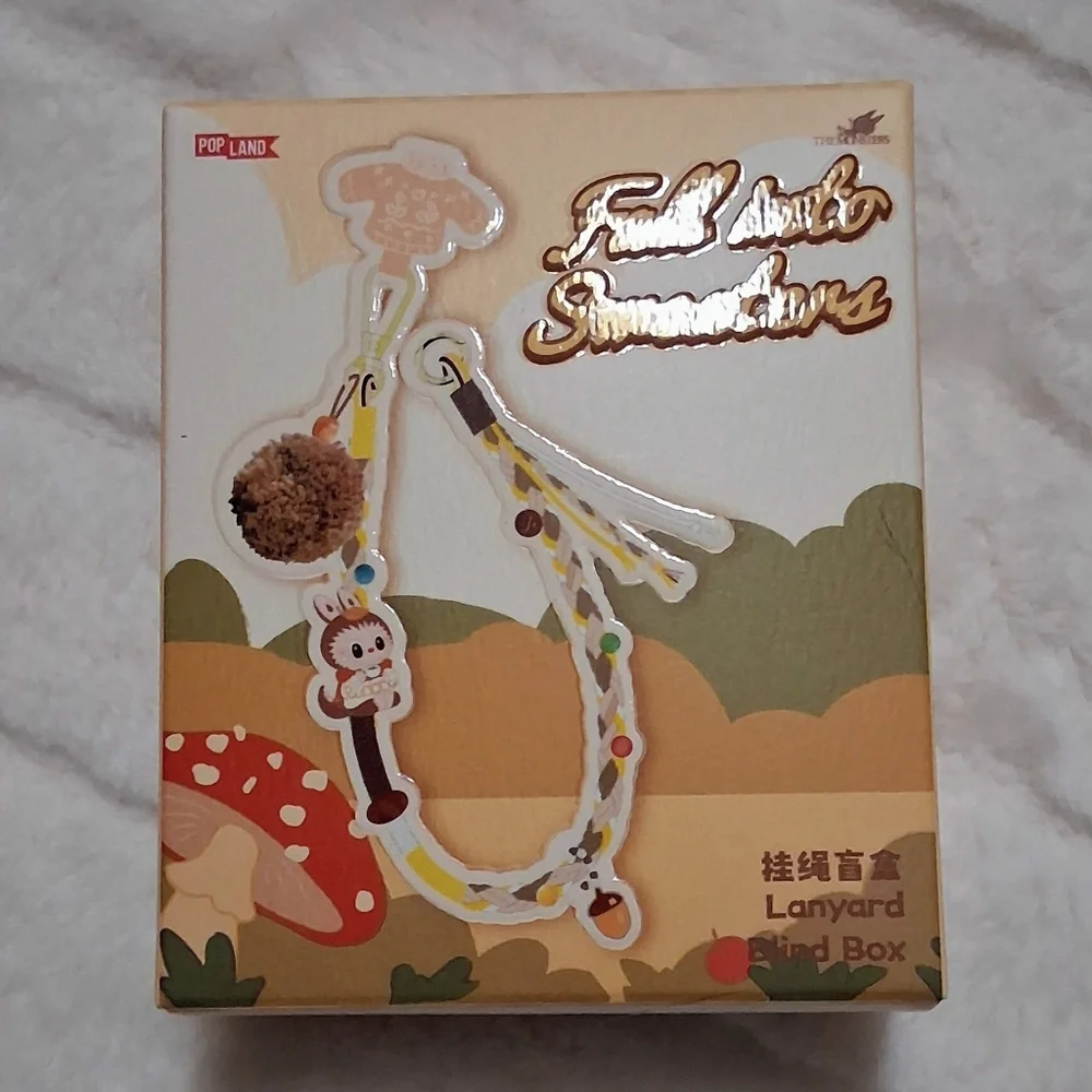 POP LAND EXCLUSIVE. THE MONSTERS LABUBU FALL INTO SWEATERS SERIES LANYARD Mokoko